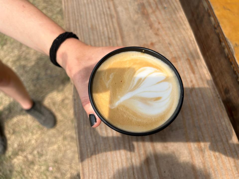 A latte, complete with fancy foam art, from Just Brewed Coffee.