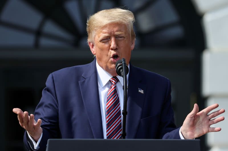 FILE PHOTO: U.S. President Donald Trump speaks about efforts to curb federal regulations during South Lawn event at the White House in Washington