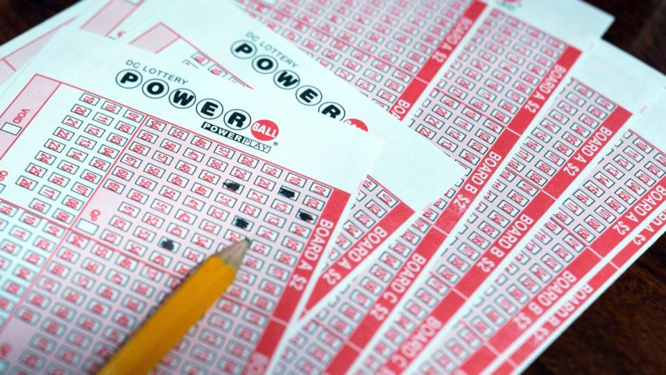 PHOTO: A Powerball multi-state lottery ticket is shown at a retailer in Washington, D.C., April 2, 2024.  (Will Oliver/EPA via Shutterstock)