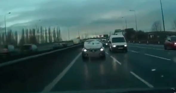 'Stupid' driver spotted on motorway with windscreen covered in snow (video)