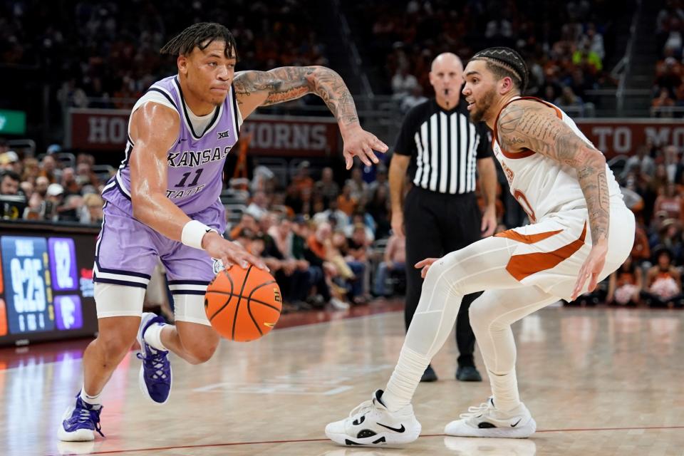 Kansas State forward Keyontae Johnson (11) drives to the basket against Texas' Timmy Allen (0) during their Jan. 3 game at Moody Center in Austin, Texas. Johnson scored 28 points in the Wildcats' 116-103 victory.