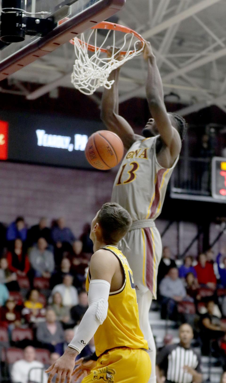 Nelly Junior Joseph of Iona dunks during a MAAC basketball game against Canisius at Iona University in New Rochelle Dec. 4, 2022. Iona defeated Canisius 90-60.