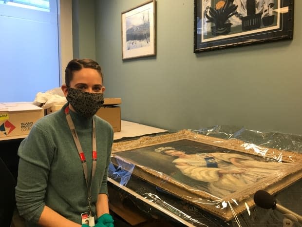 Conservator Sophia Zweifel says after a few weeks of work and an appraisal the painting will be returned to the council chamber walls — hopefully with more details uncovered about its provenance.