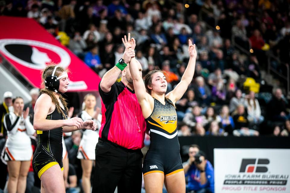 Charles City's Lilly Luft celebrates after winning the 130-pound state championship Friday at Xtream Arena in Coralville.