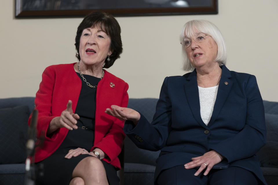 Senate Appropriations Committee ranking member Sen. Susan Collins, R-Maine, left, and Senate Appropriations Committee chair Sen. Patty Murray, D-Wash., speak during an interview with the Associated Press, along with Shalanda Young, the first Black woman to lead the Office of Management and Budget; House Appropriations Committee ranking member Rep. Rosa DeLauro, D-Conn.; and House Appropriations Committee chair Rep. Kay Granger, R-Texas, at the Capitol in Washington, Thursday, Jan. 26, 2023. It's the first time in history that the four leaders of the two congressional spending committees are women. (AP Photo/Manuel Balce Ceneta)