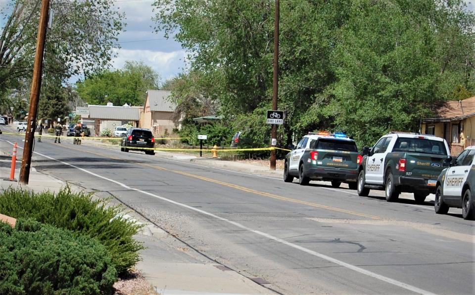 Yellow tape stretched across North Dustin Avenue in Farmington marks the scene of the May 15 mass shooting that claimed the lives of three women -- an incident invoked by U.S. Sen. Martin Heinrich on Dec. 5 while he introduced a new gun-control measure at the U.S. Capitol in Washington.