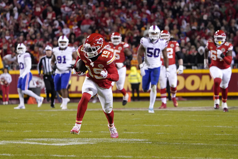 Kansas City Chiefs wide receiver Kadarius Toney runs to the end zone after catching a lateral by teammate Travis Kelce during the second half of an NFL football game against the Buffalo Bills Sunday, Dec. 10, 2023, in Kansas City, Mo. The play was nullified after Toney was called for being offside on the play. (AP Photo/Ed Zurga)