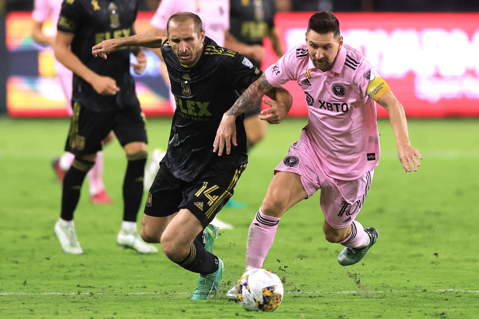 LAFC's Giorgio Chiellini (left) and Inter Miami's Lionel Messi battle for the ball Sunday at BMO Stadium in Los Angeles. Inter Miami won the match 3-1. (Photo by Sean M. Haffey/Getty Images)