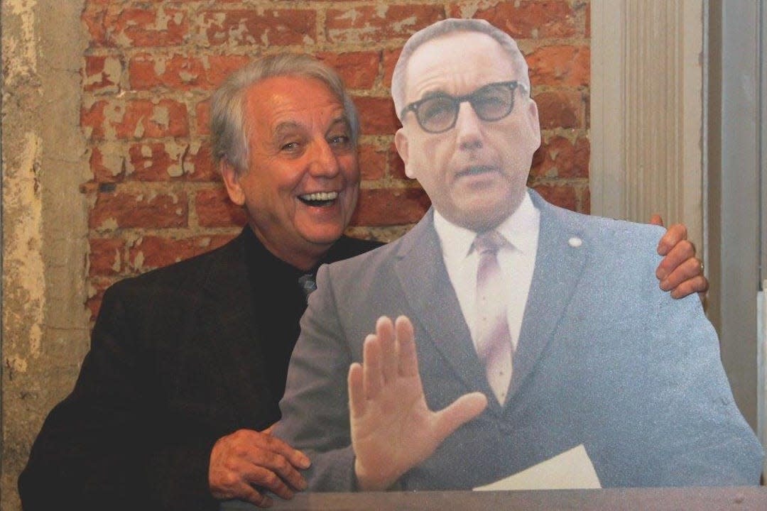 Actor Bob Gunton views a life-size cutout of himself as Warden Norton from "The Shawshank Redemption."