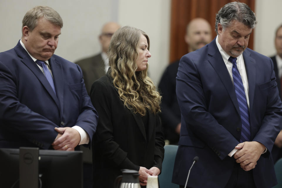 Lori Vallow Daybell stands and listens as the jury's verdict is read at the Ada County Courthouse in Boise, Idaho on Friday May 12, 2023. The Idaho jury convicted Daybell of murder in the deaths of her two youngest children and a romantic rival, a verdict that marks the end of a three-year investigation that included bizarre claims of zombie children, apocalyptic prophesies and illicit affairs. (AP Photo/Kyle Green)