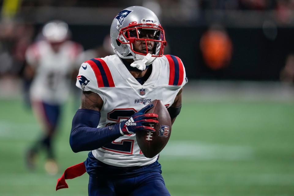 Nov 18, 2021; Atlanta, Georgia, USA; New England Patriots cornerback J.C. Jackson (27) runs after intercepting a pass against the Atlanta Falcons during the fourth quarter at Mercedes-Benz Stadium.