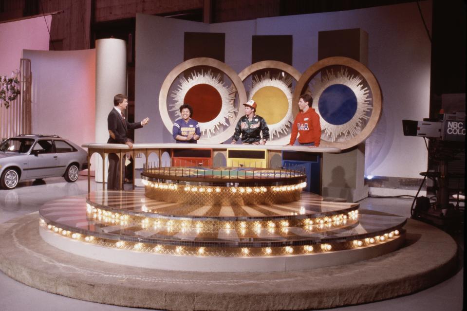 WHEEL OF FORTUNE -- Pictured: (l-r) Host: Pat Sajak with unknown contestants -- Photo by: Gene Arias/NBCU Photo Bank