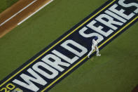 Los Angeles Dodgers' Will Smith walks to the dugout after striking out against the Tampa Bay Rays during the second inning in Game 1 of the baseball World Series Tuesday, Oct. 20, 2020, in Arlington, Texas. (AP Photo/David J. Phillip)