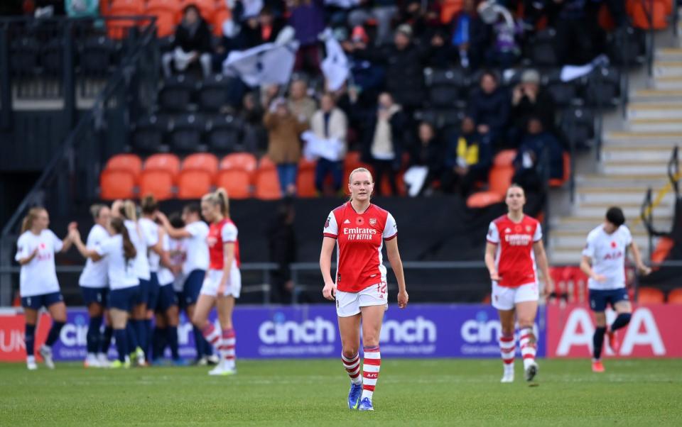 Arsenal's Frida Maanum trudges back to the centre circle after Rachel Williams' opener for Spurs - GETTY IMAGES