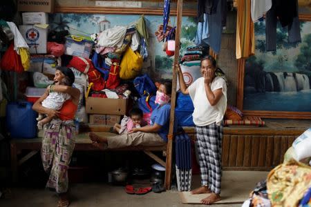 Evacuated residents rest at an evacuation centre in Iligan, while government forces fight insurgents from the Maute group in Marawi, Philippines June 27, 2017. REUTERS/Jorge Silva