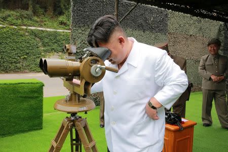 North Korean leader Kim Jong Un provides field guidance during a fire drill of ballistic rockets by Hwasong artillery units of the KPA Strategic Force, in this undated photo released by North Korea's Korean Central News Agency (KCNA) in Pyongyang September 6, 2016. KCNA/via Reuters