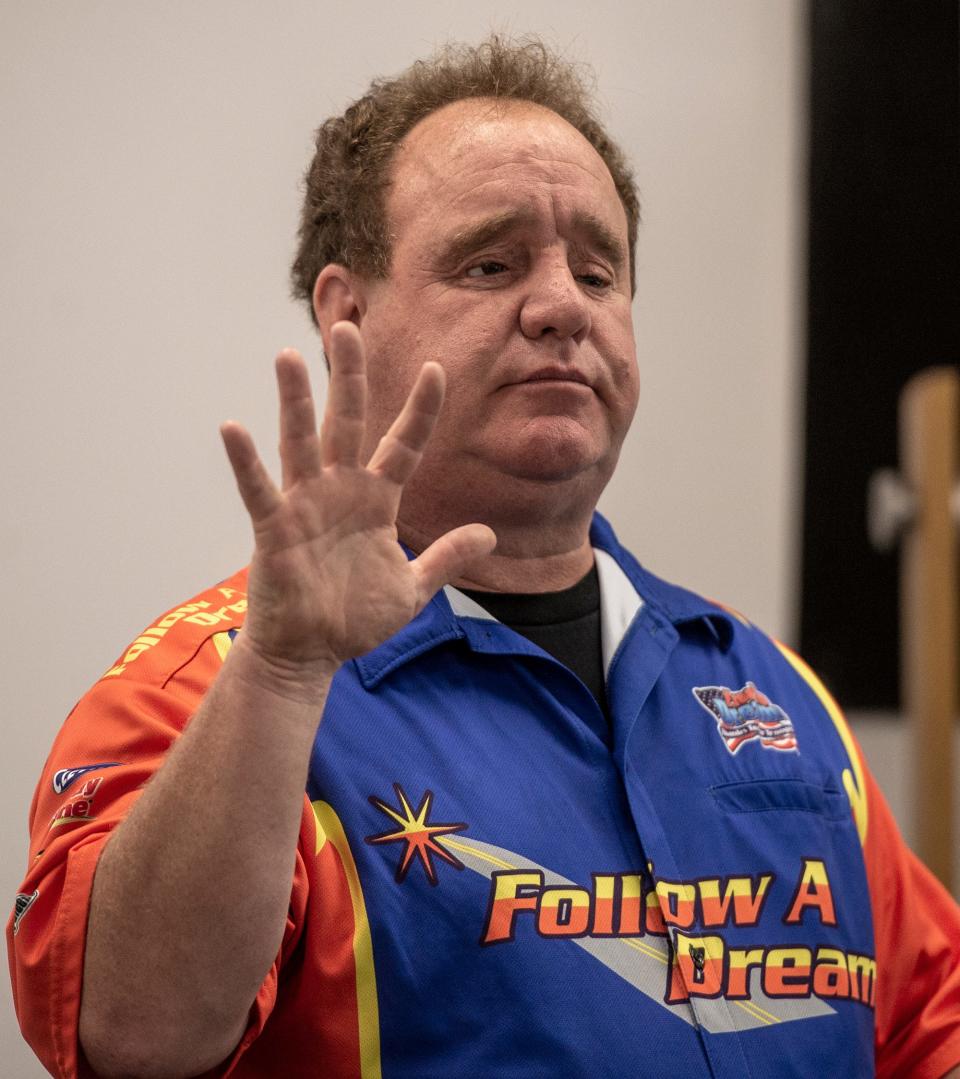Jay Blake, president of the Follow A Dream drag racing team, was the featured speaker at MassBay Community College's automotive technology summer boot camp, July 27, 2023. Blake, a race crew chief, has been blind for more than 25 years due to a workplace accident.
