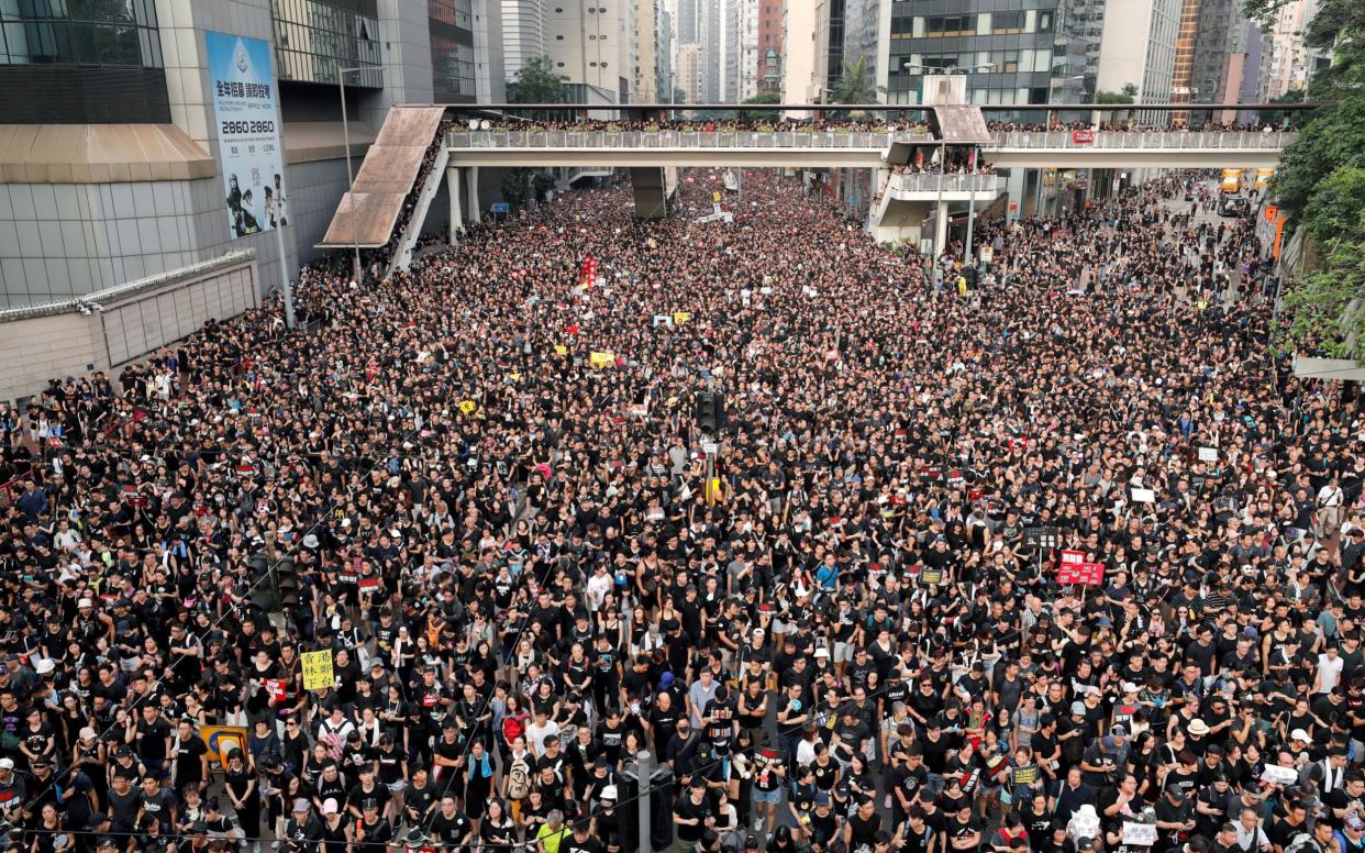 File image of protesters attending a pro-democracy demonstration in Hong Kong - Reuters