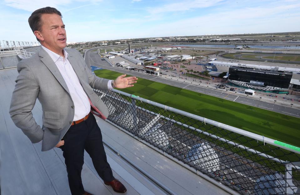 Daytona International Speedway President Frank Kelleher stands on the roof of the grandstands overlooking the grass area in the trioval, also known as "the ballfield," on Tuesday, Dec. 5, 2023. Kelleher is involved in talks with the Jacksonville Jaguars about becoming the NFL team's temporary home when EverBank Stadium undergoes a massive makeover a few years from now, possibly in 2027. If that happens, Jags home games would be played on the Speedway's ballfield.