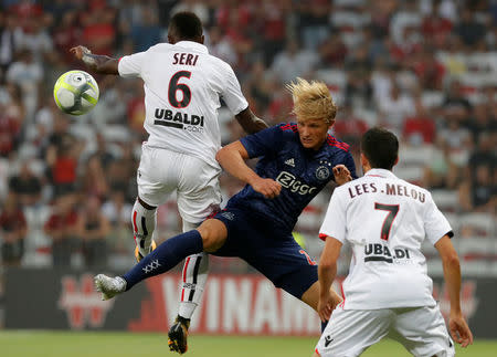 Soccer Football - Champions League - OGC Nice vs Ajax Amsterdam - Third Qualifying Round First Leg - Nice, France - July 26, 2017 Nice's Jean Seri in action with Ajax's Kasper Dolberg REUTERS/Eric Gaillard