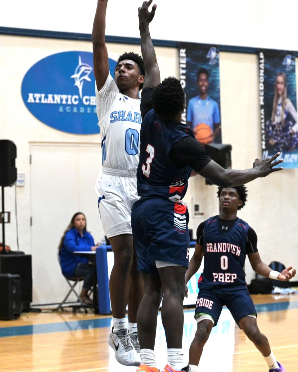 Atlantic Christian's Ezra Gelin shoots a jumper during the second half of the Sharks' regional quarterfinals against Grandview Prep on Feb. 15, 2024.