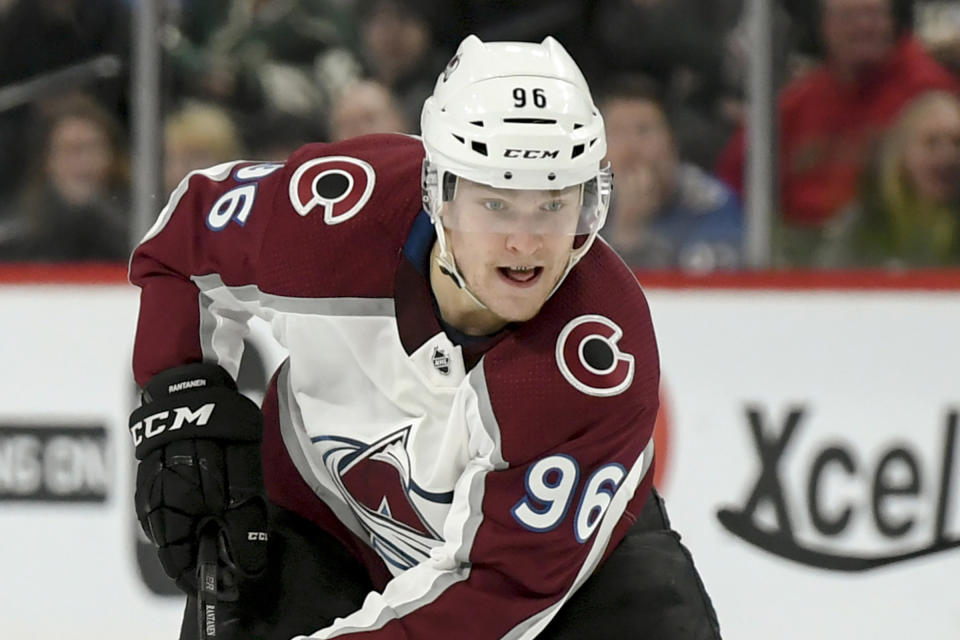 FILE - In this March 19, 2019, file photo, Colorado Avalanche left wing Mikko Rantanen skates against the Minnesota Wild during the second period of an NHL hockey game, in St. Paul, Minn. With NHL training camps set to open this week, roughly a dozen prominent restricted free agents still don’t have contracts, including Tampa Bay’s Brayden Point, Toronto’s Mitch Marner, Boston’s Charlie McAvoy and Brandon Carlo and Colorado’s Mikko Rantanen. Those absences could hang over their teams for days, weeks or even months and have raised questions about why it’s taken so long to get them signed. (AP Photo/Craig Lassig, File)