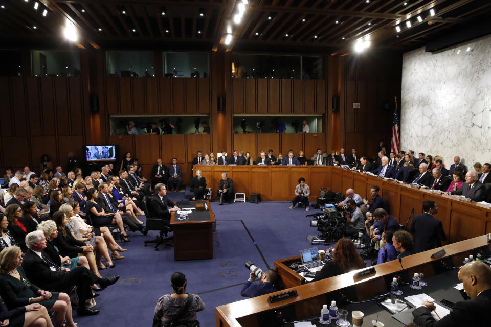 FILE - In this Sept. 4, 2018, file photo, Supreme Court nominee Brett Kavanaugh, left, attends his confirmation hearing with the Senate Judiciary Committee on Capitol Hill in Washington. (AP Photo/Jacquelyn Martin, File)