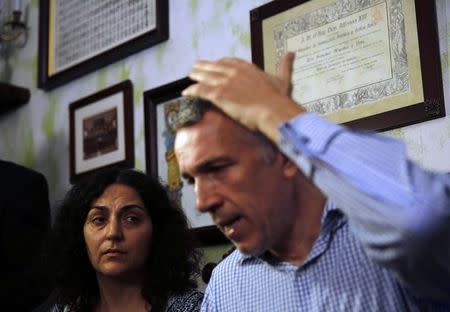 Naghemeh (L) and Brett King, parents of Ashya King, attend a news conference in the Andalusian capital of Seville, September 3, 2014. REUTERS/Marcelo del Pozo