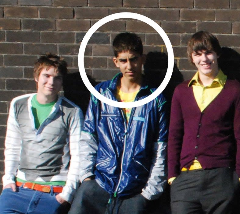 Joe Dempsie, Dev Patel, Nicholas Hoult in casual wear posing against a brick wall