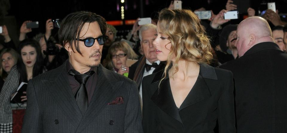 Amber Heard and Johnny Depp attend 'The Danish Girl' premiere during the 2015 Toronto International Film Festival held at the Princess of Wales Theatre on September 12, 2015 in Toronto, Canada.