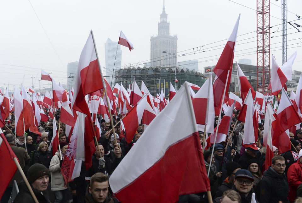 Thousands walk in the annual March of Independence organized by far right activists to celebrate 100 years of Poland's independence the nation regaining its sovereignty at the end of World War I after being wiped off the map for more than a century. (AP Photo/Alik Keplicz)