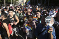 Participants march through a street during a pride parade in Taipei, Taiwan, Saturday, Oct. 31, 2020. (AP Photo/Chiang Ying-ying)