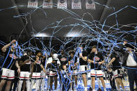 UConn celebrates winning their first outright Big East regular-season title in 25 years after an NCAA college basketball game against Seton Hall, Sunday, March 3, 2024, in Storrs, Conn. (AP Photo/Jessica Hill)