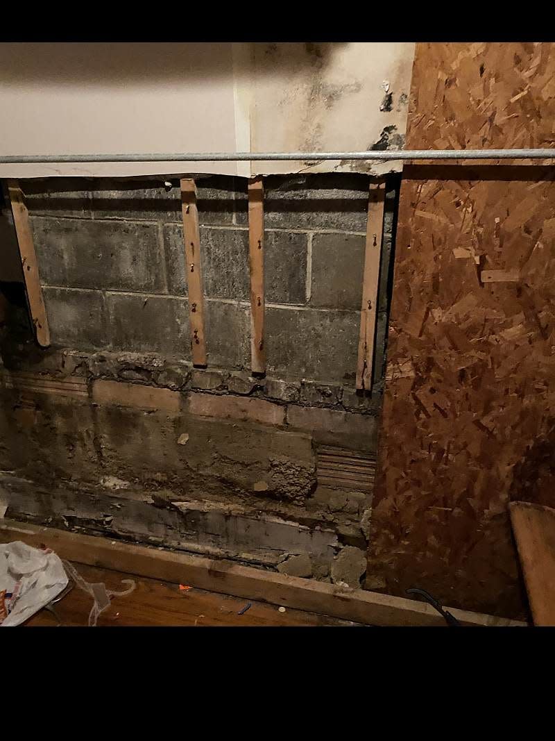 Water damage in the men's dressing room at the Zanesville Community Theatre. Donations are being sought for repairs of the back wall, estimated at $30,900.