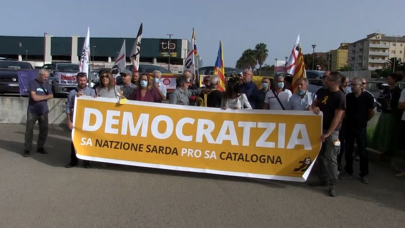 Protesters gather outside Sardinia court in support of Catalan separatist leader