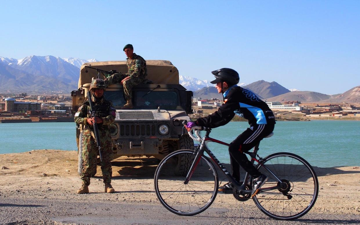 Nazifa on a training ride in Kabul in 2014 - Special report: The desperate choice facing Afghanistan's female cyclists - SHANNON GALPIN