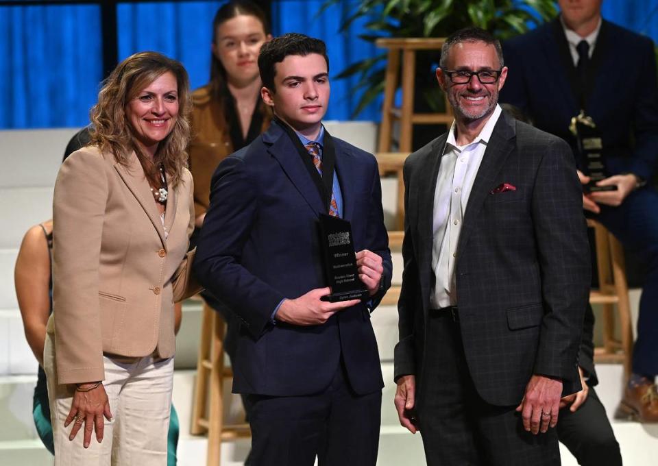 2023 Golden Herald Award for Mathematics Dylan Jackson with presenters Jackie Barron and Tom McDougal Thursday night.