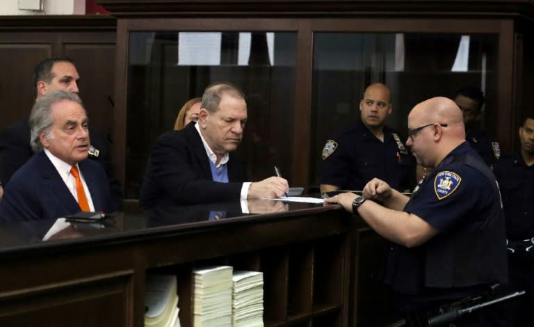 Disgraced Hollywood mogul Harvey Weinstein (C), at his arraignment in New York May 25, 2018 on rape and sex crimes charges
