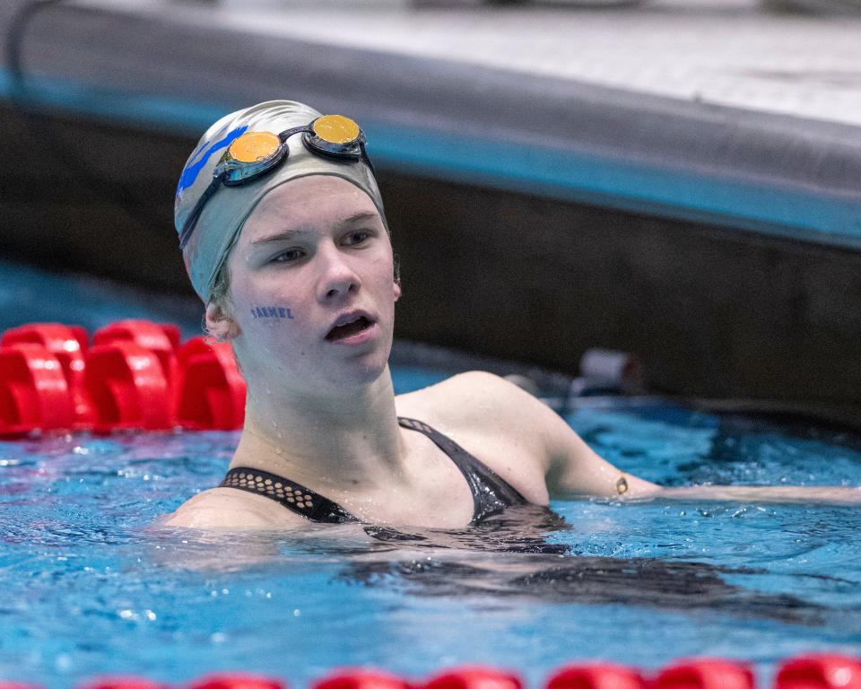 Carmel High School’s Alex Shackell reacts after competing in the 50 Yard Freestyle event during the 2022 Girls’ Swimming & Diving State Tournament, Saturday, Feb. 12, 2022, at Indiana University Natatorium in Indianapolis.