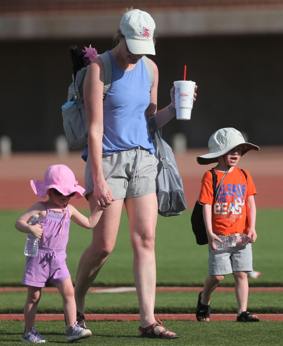 San Angelo Central High School Teacher of the Year Sarah Willis and her children Briar, left, and Beau, attended the Bobcats' spring football game at San Angelo Stadium on Wednesday, May 18, 2022. Her husband is Central defensive coordinator Josh Willis.