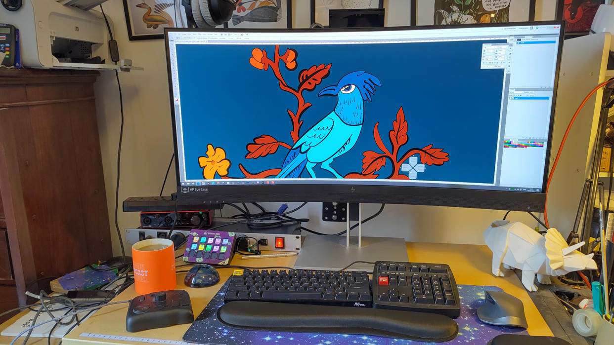  A HP E34m G4 monitor on a desk. 