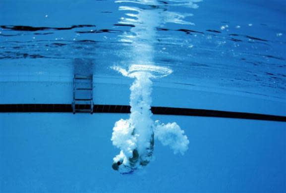 U.S platform diver Haley Ishimatsu trains for the London 2012 Olympics in Los Angeles, March 28, 2012.