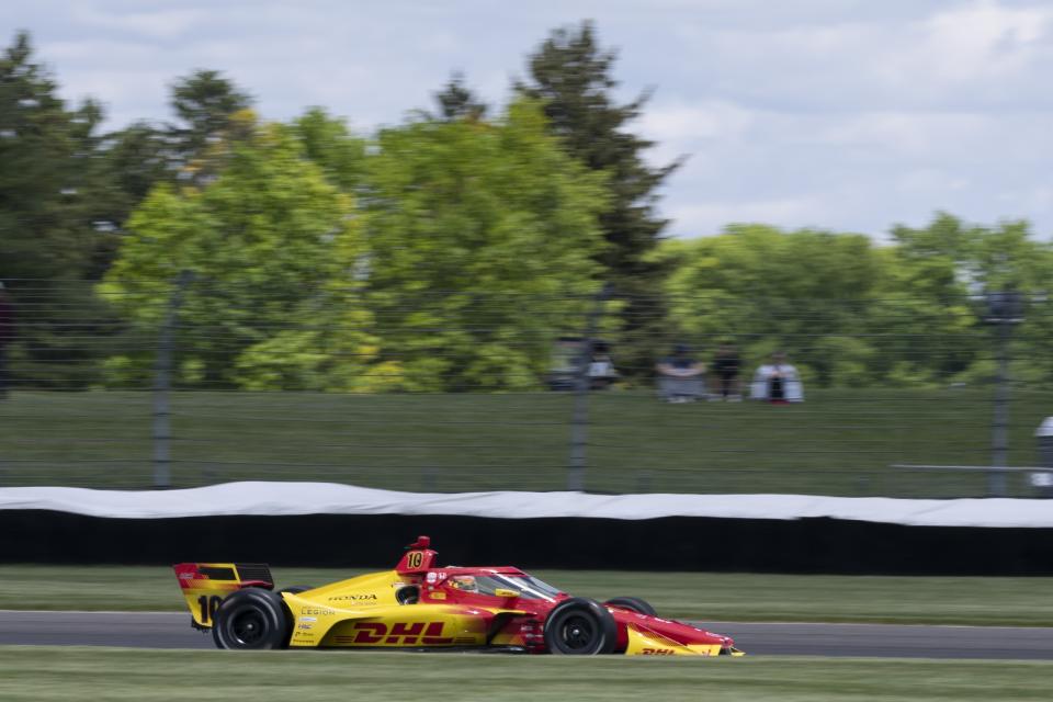 Alex Palou, of Spain, drives during a practice session for the IndyCar Grand Prix auto race at Indianapolis Motor Speedway, Friday, May 10, 2024, in Indianapolis. (AP Photo/Darron Cummings)