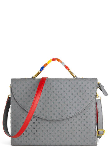 <div class="caption-credit"> Photo by: ModCloth</div><b>Messenger Bag <br></b> Messenger bags are usually my go-to bag. They hold a ton and you can wear one across your body to free up both hands! Plus, they look way more stylish than a backpack! <br> <a rel="nofollow noopener" href="http://blogs.babble.com/family-style/2012/11/12/7-handbags-every-woman-must-own/#messenger-bag" target="_blank" data-ylk="slk:Get it here;elm:context_link;itc:0;sec:content-canvas" class="link "><i>Get it here</i></a> <br>