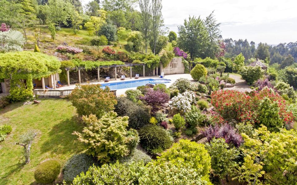 Garden and pool of Villa Brión, near Santiago de Compostela