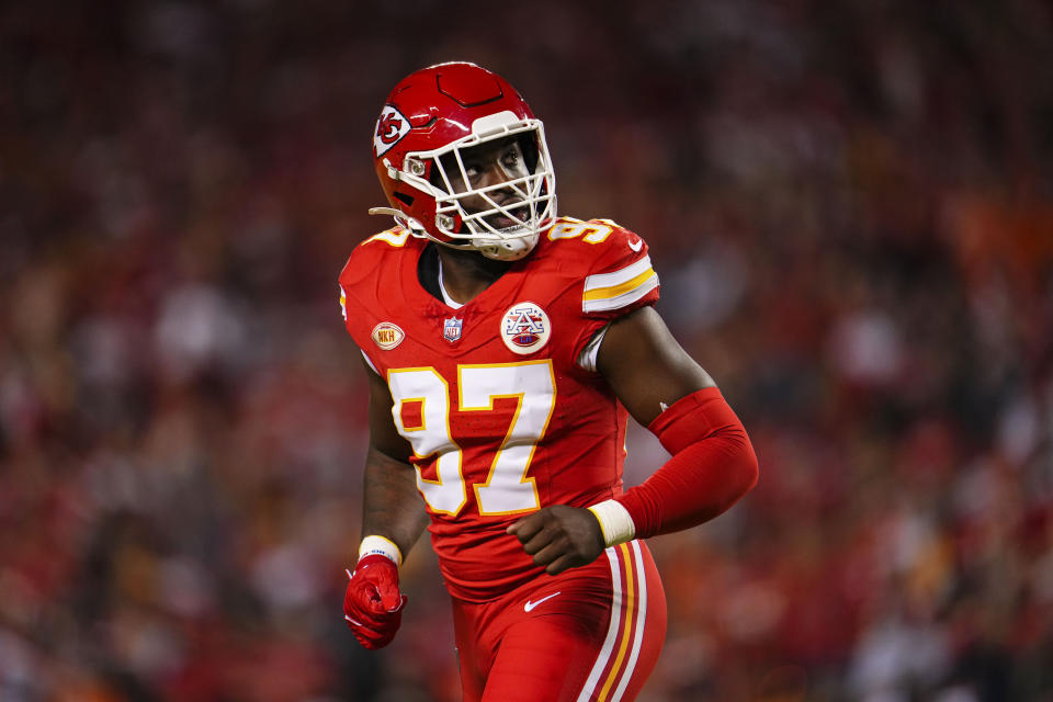 KANSAS CITY, MO - OCTOBER 12: Felix Anudike-Uzomah #97 of the Kansas City Chiefs runs across the field during an NFL football game against the Denver Broncos at GEHA Field at Arrowhead Stadium on October 12, 2023 in Kansas City, Missouri. (Photo by Cooper Neill/Getty Images)