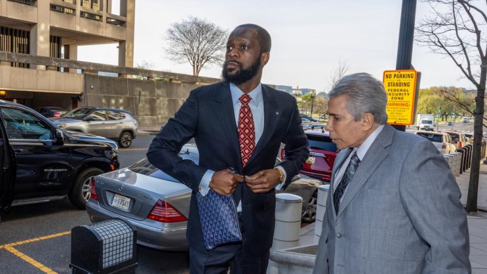 Pras Michel and his lawyer David Kenner outside U.S. District Court earlier this month | Photo by Tasos Katopodis/Getty Images