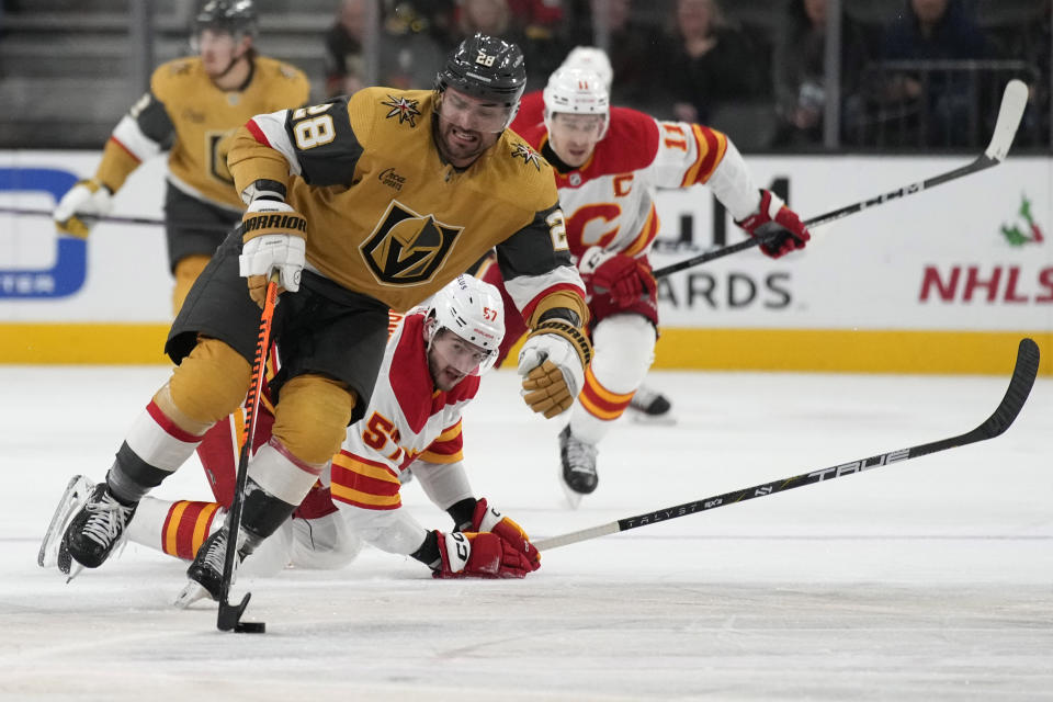 Vegas Golden Knights left wing William Carrier (28) skates up the ice against the Calgary Flames during the second period of an NHL hockey game Tuesday, Dec. 12, 2023, in Las Vegas. (AP Photo/John Locher)