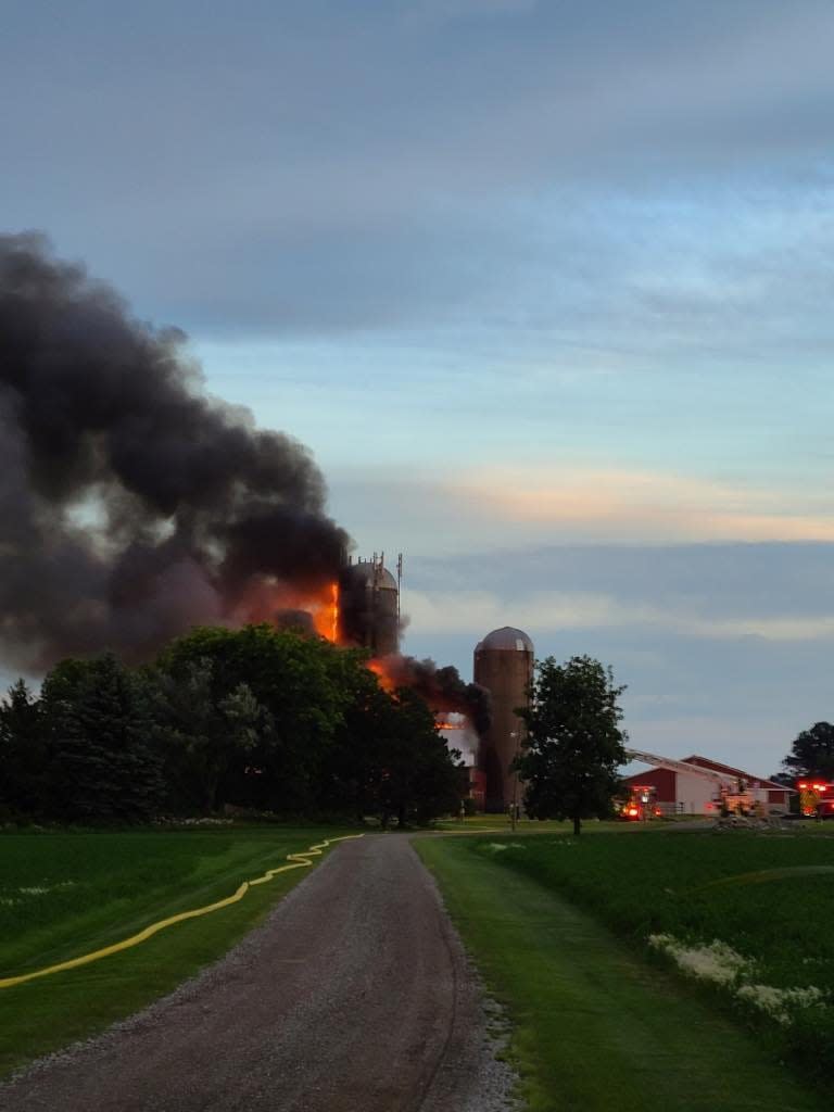 Area fire departments battled a barn blaze on the evening of July 18, 2022 in Lawrence, Wis.