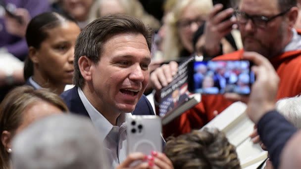 PHOTO: Florida Gov. Ron DeSantis greets people in the crowd during an event, Mar. 10, 2023, in Davenport, Iowa. (Ron Johnson/AP)